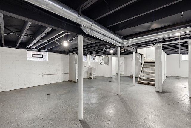 basement featuring sink and a wealth of natural light