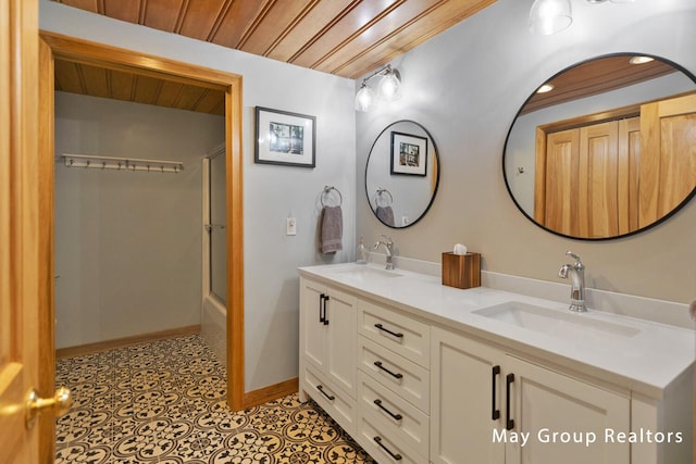 bathroom featuring vanity, tile patterned floors, wooden ceiling, and shower / bath combination with glass door