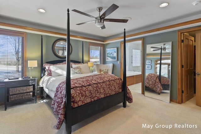 carpeted bedroom featuring crown molding, ceiling fan, and multiple windows