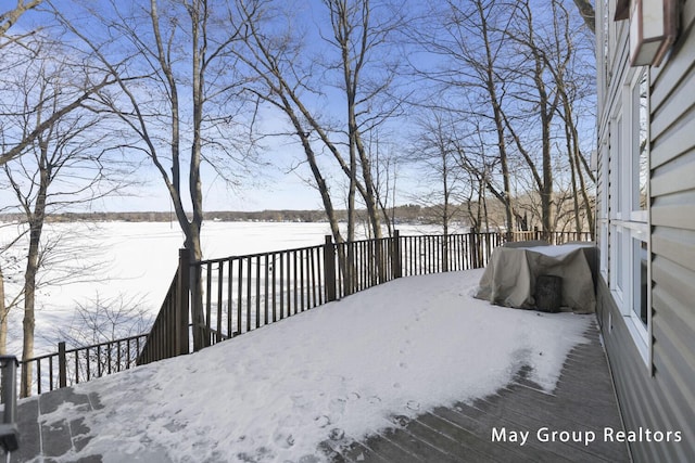 view of snow covered deck