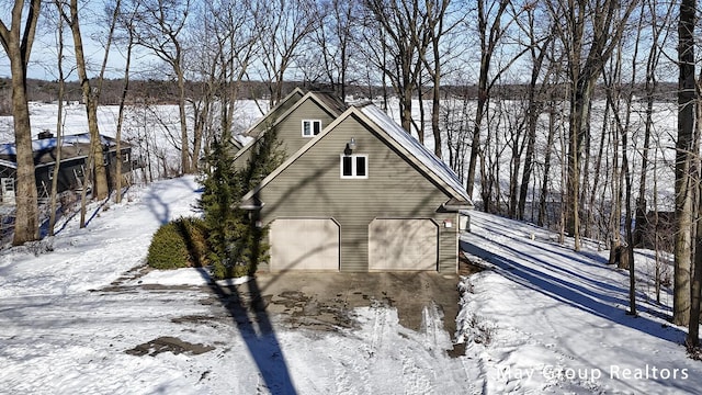 exterior space with a garage