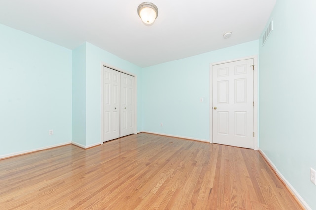 unfurnished bedroom with light hardwood / wood-style flooring