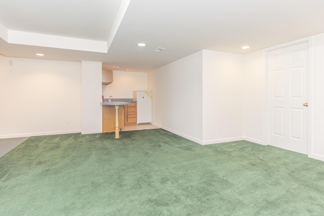 basement with dark carpet