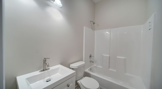 full bathroom with  shower combination, toilet, and vanity