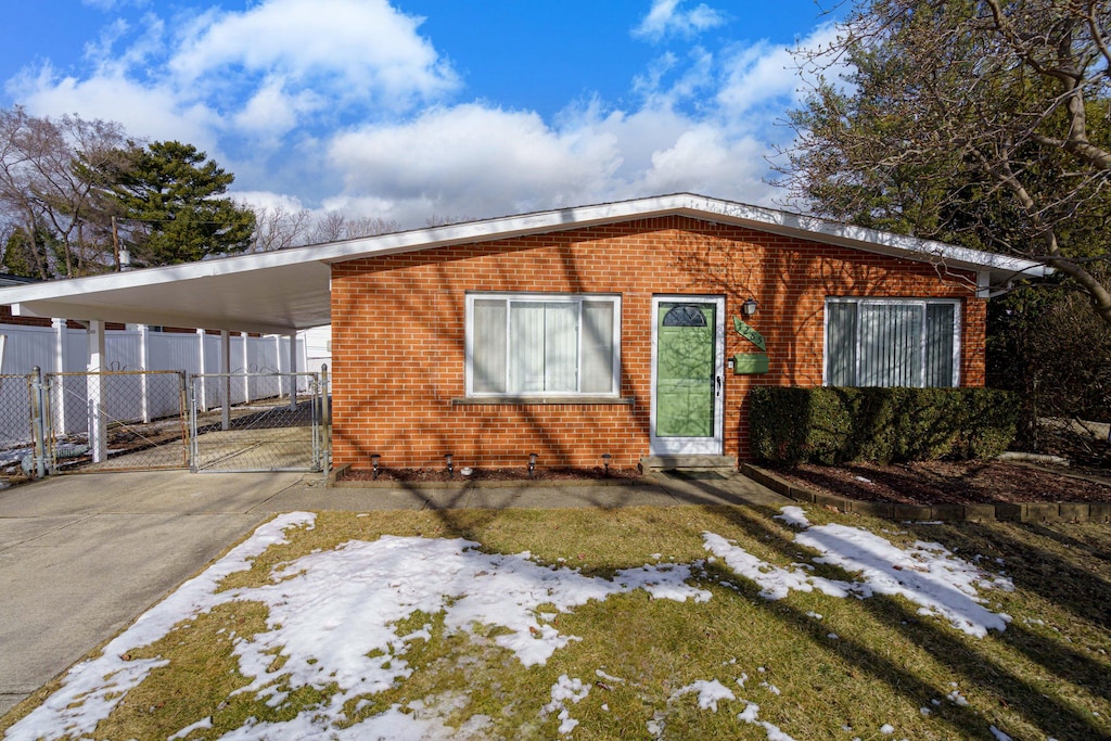 exterior space with a carport