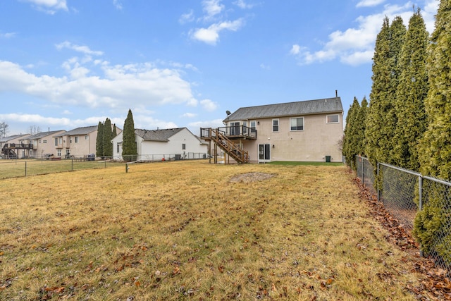 view of yard with a wooden deck