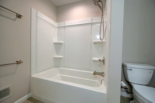 bathroom featuring  shower combination and toilet