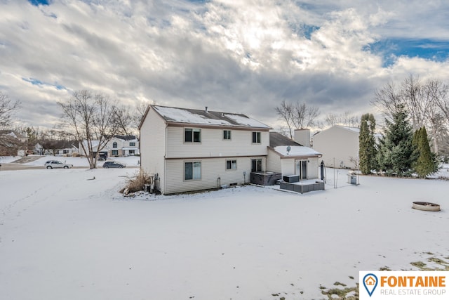 view of snow covered property