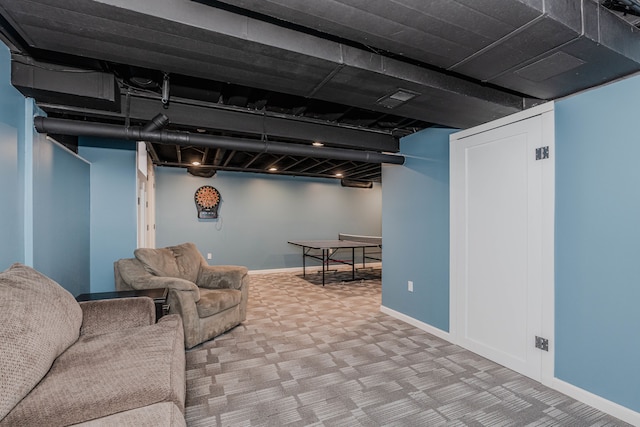 basement with carpet flooring