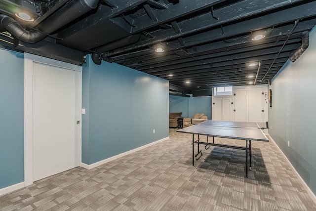 game room with light carpet