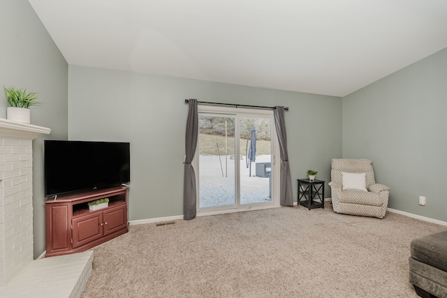 living area with carpet