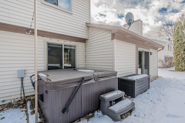 exterior space featuring a hot tub