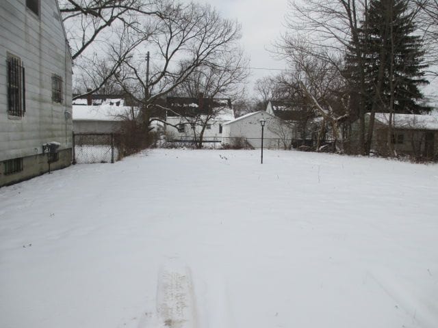 view of yard covered in snow