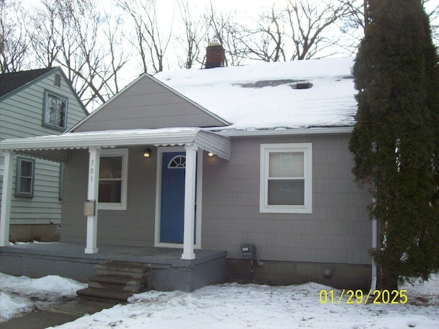 bungalow-style home with a porch