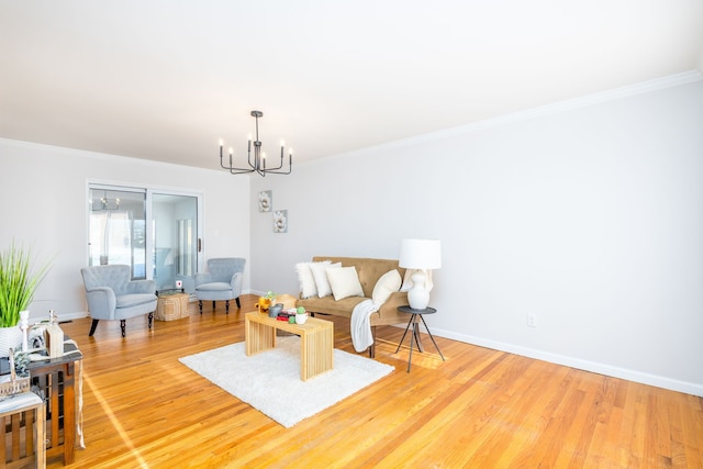 sitting room with a notable chandelier, crown molding, and wood-type flooring