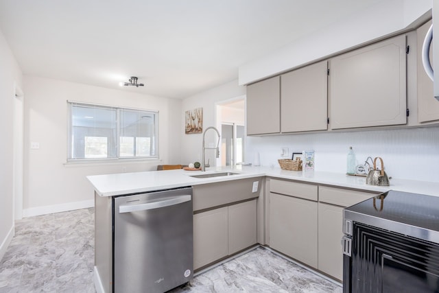 kitchen with sink, range with electric stovetop, gray cabinets, dishwasher, and kitchen peninsula