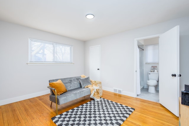 sitting room featuring light wood-type flooring