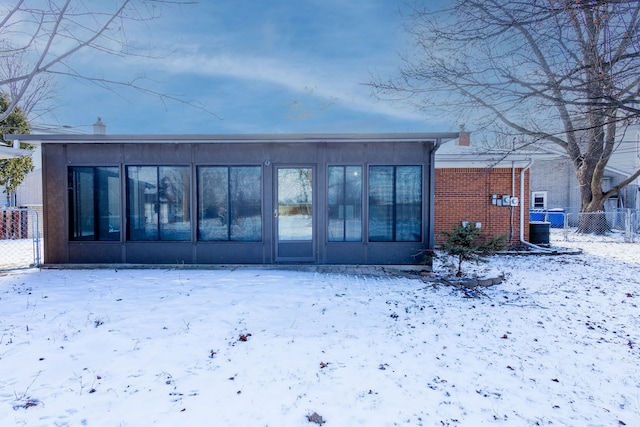 view of snow covered house