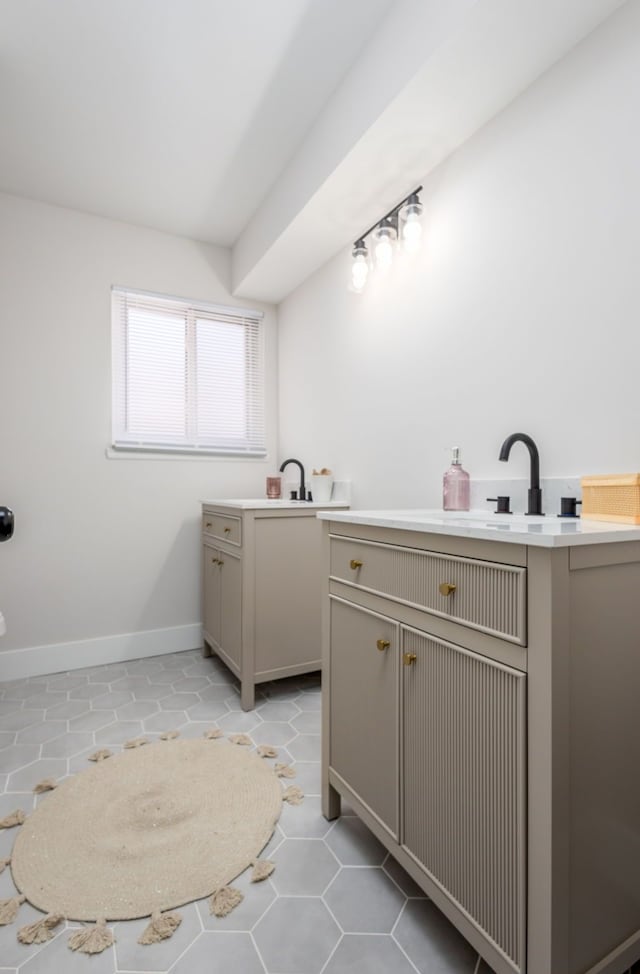 bathroom with vanity and tile patterned floors