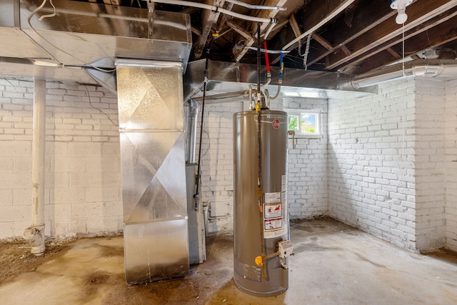 basement with water heater and heating unit