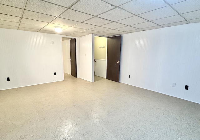 basement featuring a drop ceiling