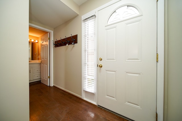 entryway with dark wood-type flooring