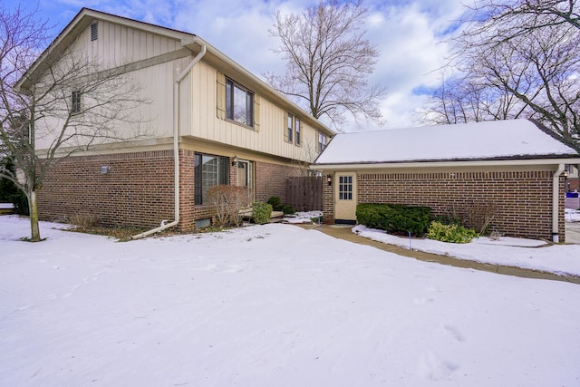 view of snow covered property