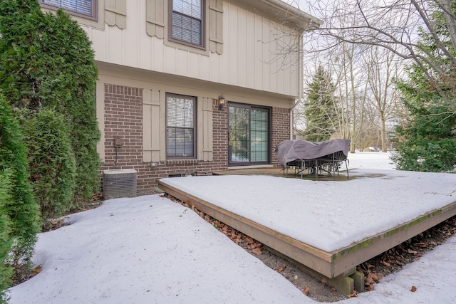 view of snow covered deck