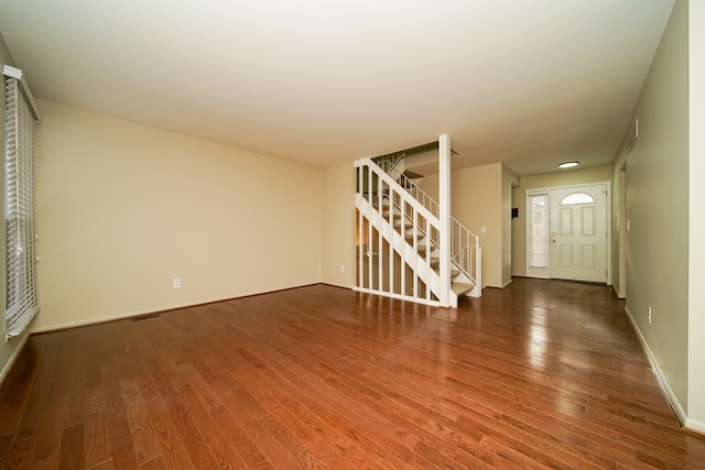 interior space with dark hardwood / wood-style flooring