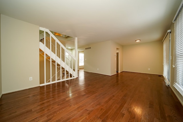 unfurnished room featuring dark hardwood / wood-style floors