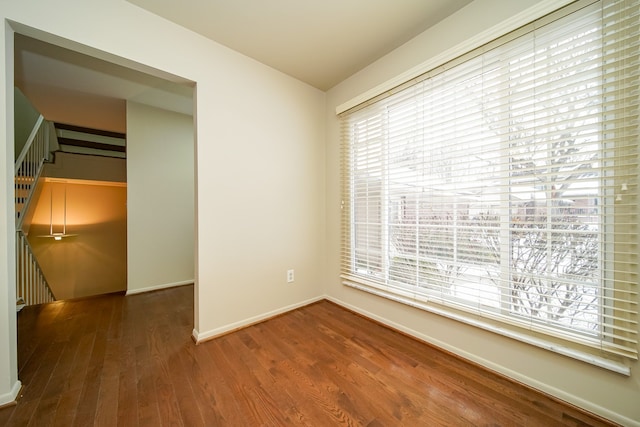 empty room featuring hardwood / wood-style flooring