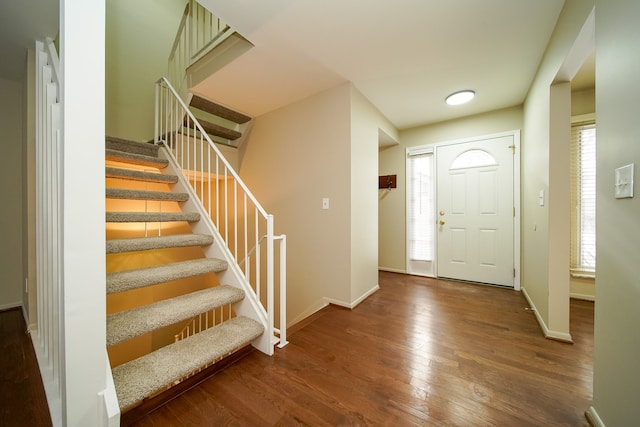 entrance foyer featuring dark hardwood / wood-style flooring