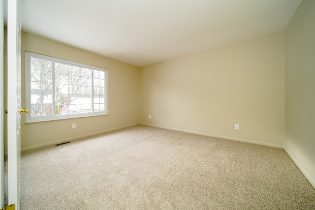 spare room with carpet flooring