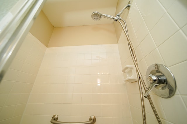 room details with a tile shower