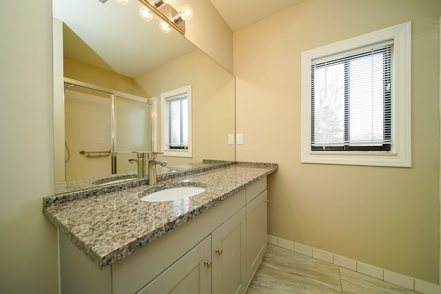 bathroom with vanity and tile patterned flooring