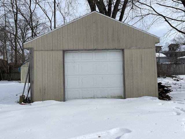 view of snow covered garage