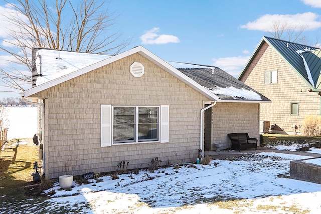 view of snow covered property