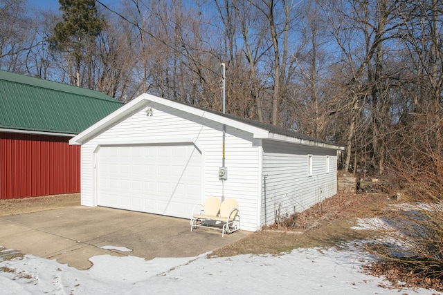 view of snow covered garage