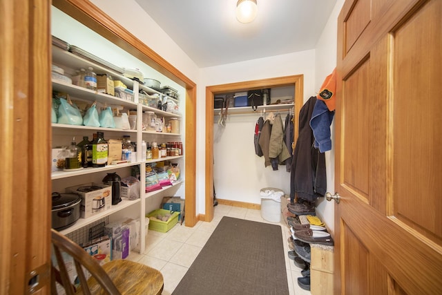 mudroom featuring light tile patterned floors