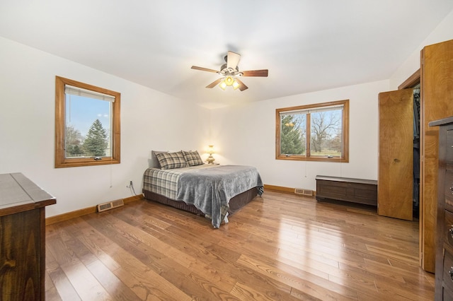 bedroom featuring ceiling fan and light wood-type flooring