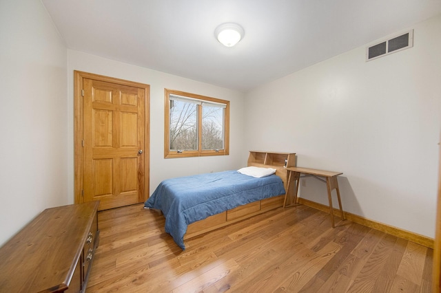 bedroom featuring light hardwood / wood-style flooring