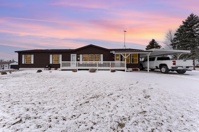 view of front of property with a carport