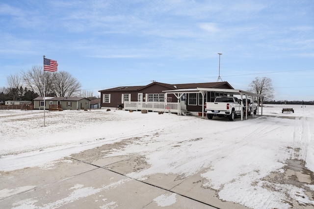 view of front facade featuring a carport