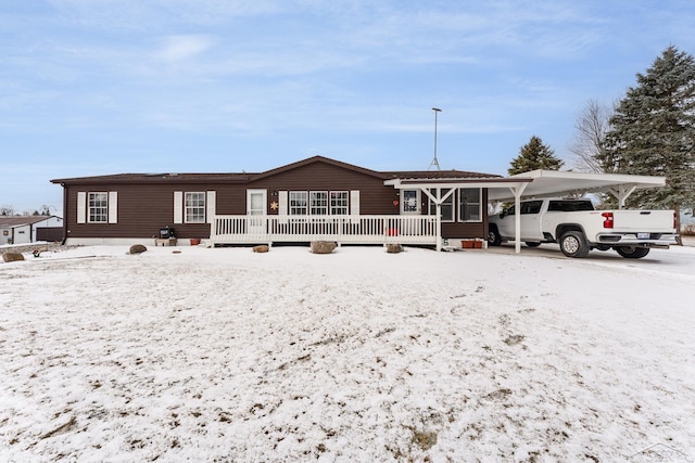 view of front of house featuring a carport