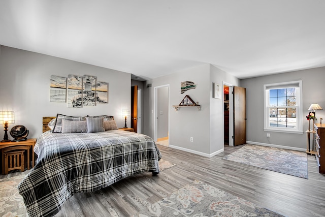 bedroom featuring hardwood / wood-style floors