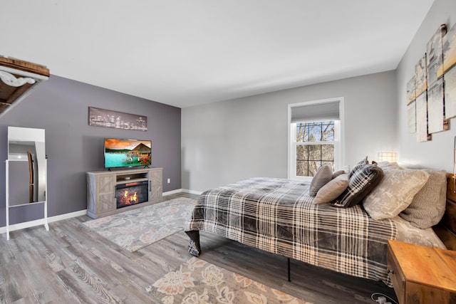 bedroom featuring hardwood / wood-style flooring