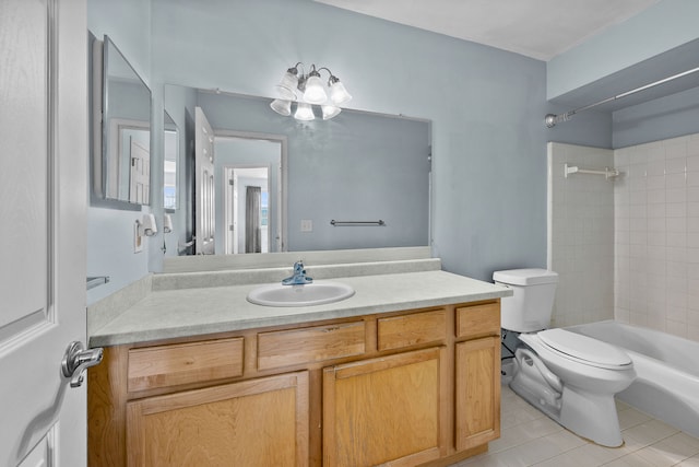 full bathroom with vanity, tile patterned floors, toilet, and washtub / shower combination