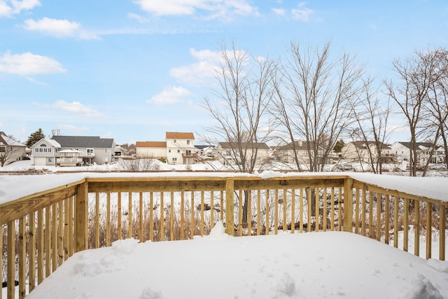 view of snow covered deck