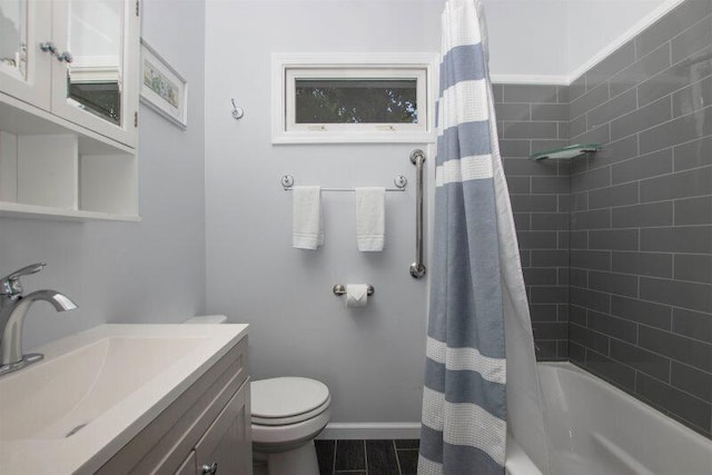 full bathroom with toilet, vanity, and shower / bathtub combination with curtain