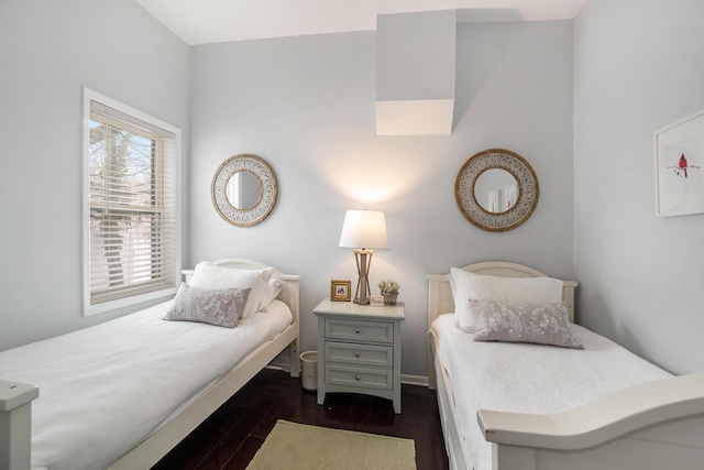 bedroom featuring dark hardwood / wood-style floors